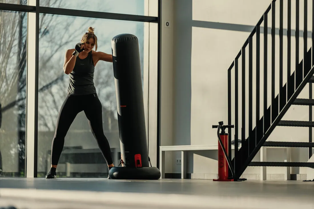 Freestanding inflatable punching bag with weightable base